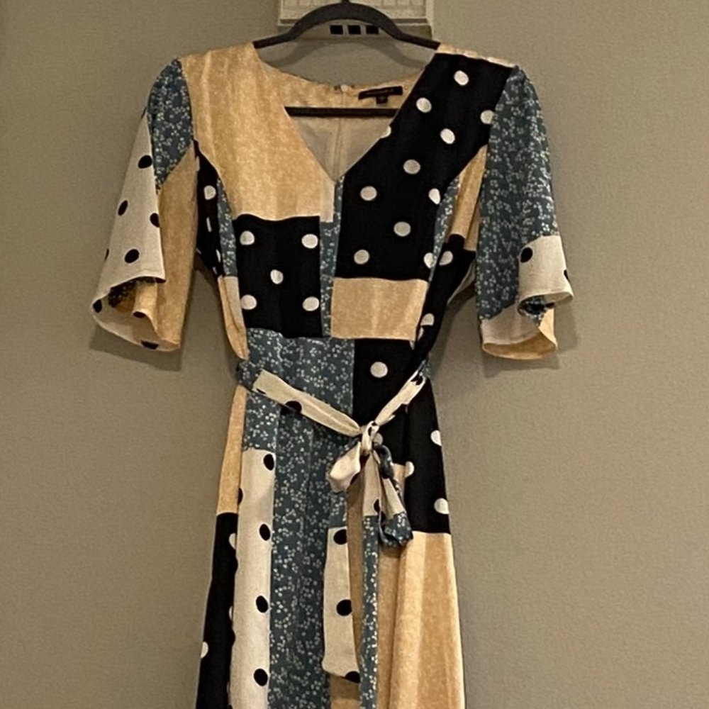 Fun flowy satin midi green, black, cream and polka dot floral patchwork design.